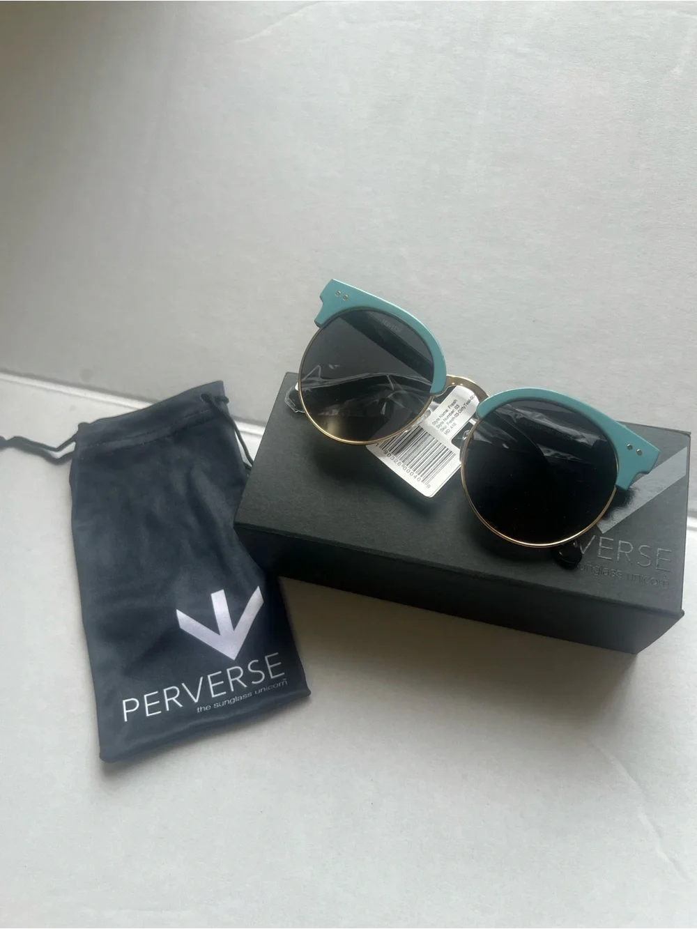 Perverse Teal Round Sunglasses with Black Lenses